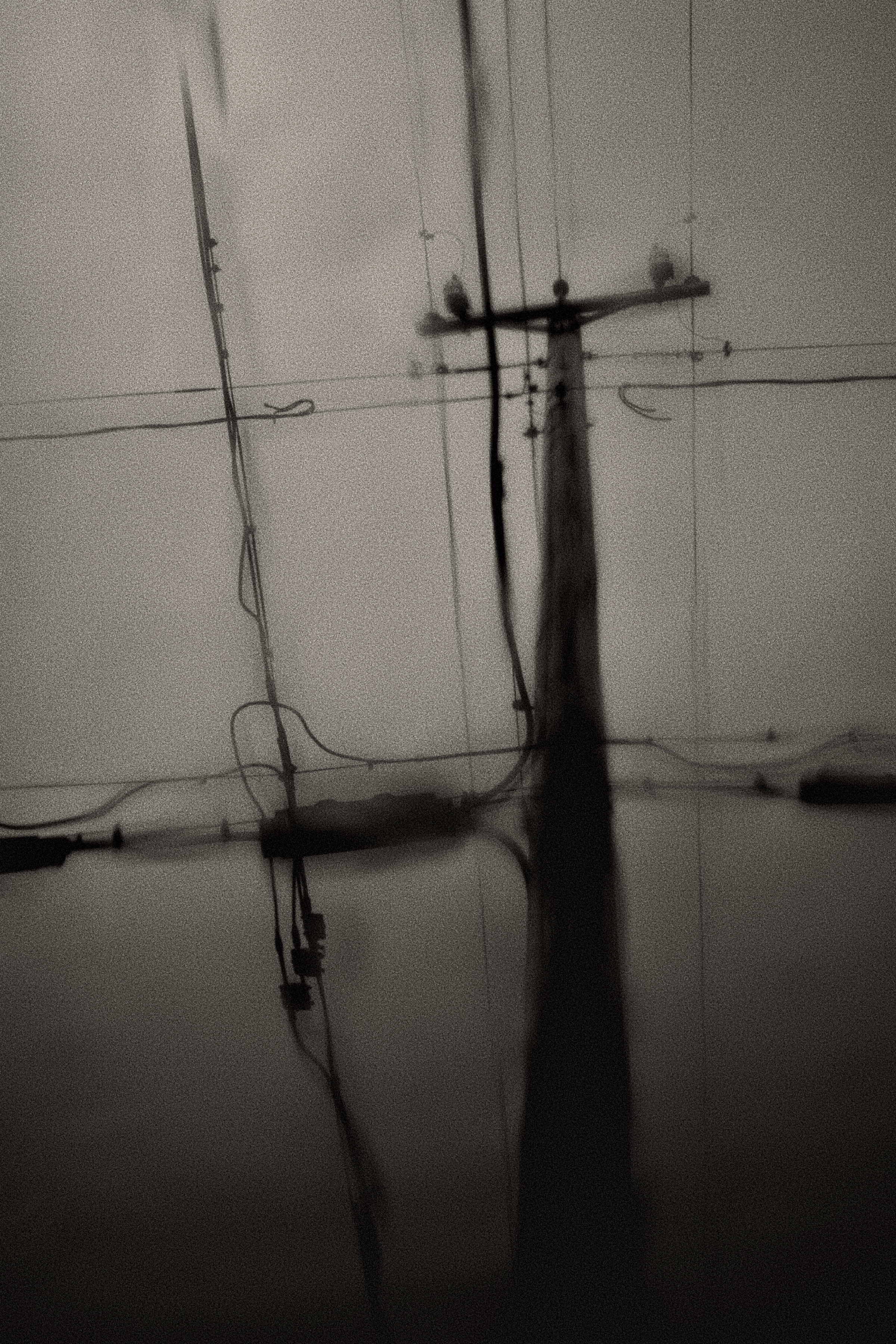 Powerline through a rainy window
